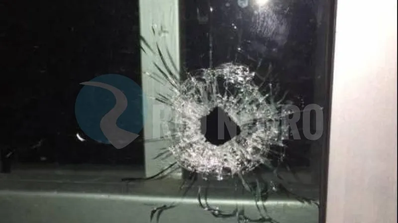 disparo ventana vidrio