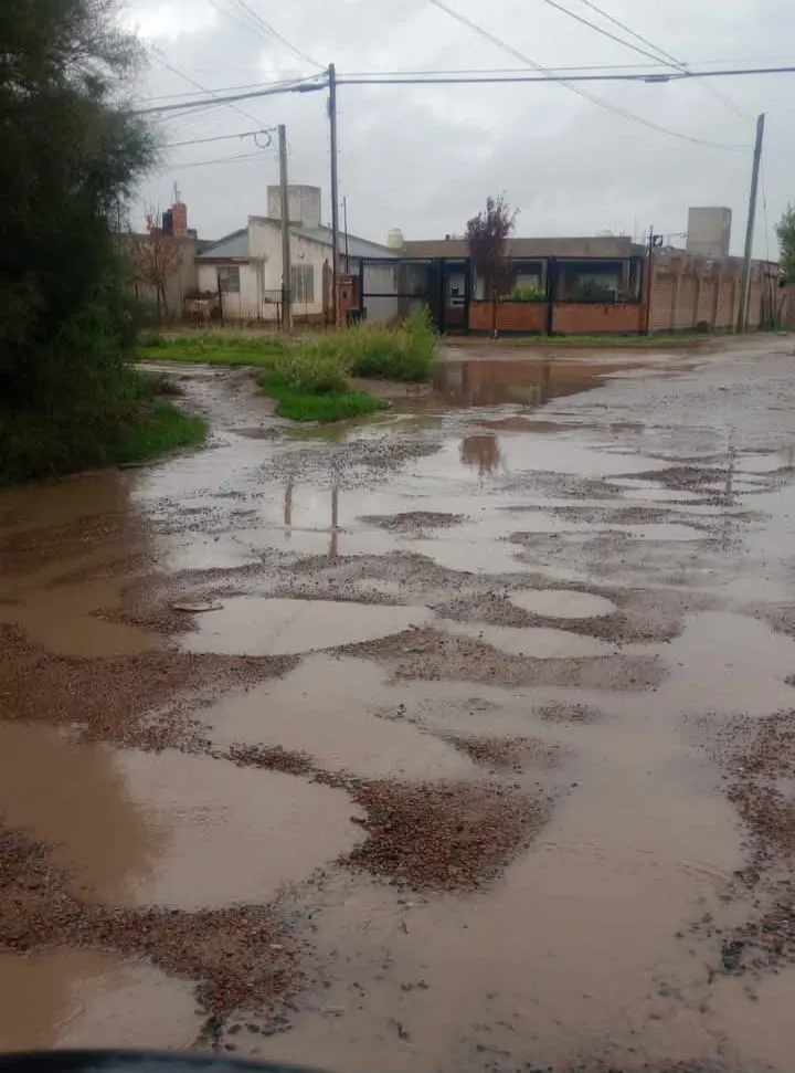 viedma, calle, lluvia, pozos